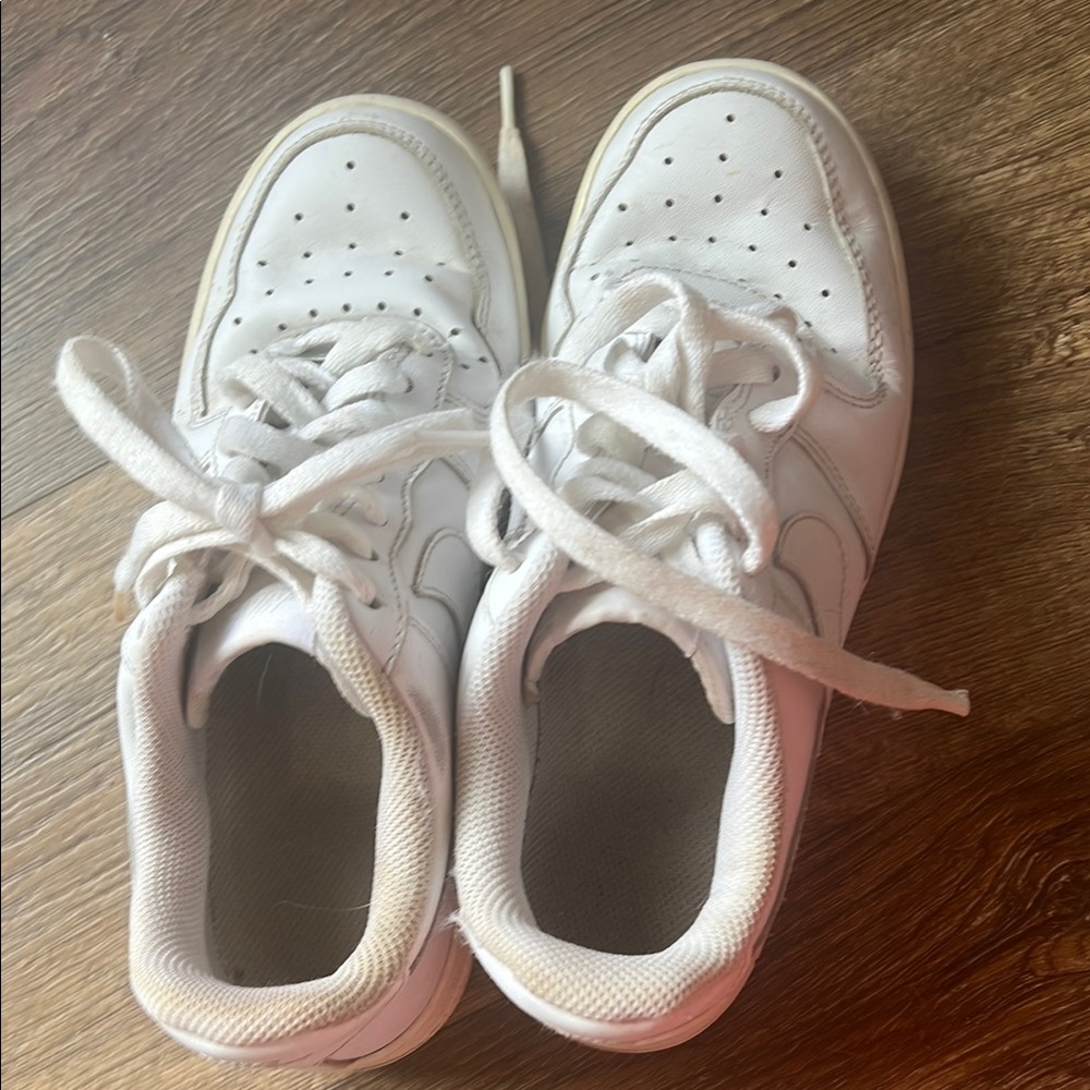 Nike air force ones, size SEVEN worn a lot.